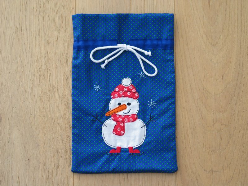 Geschenkesäckchen Schneemann auf dem Eis
