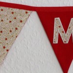 Große Wimpelkette X-MAS Sterne weiß-rot-gold